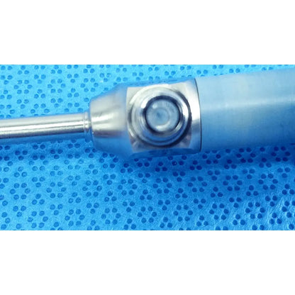 Silver-tipped stryker ideal eyes 5mm autoclavable endoscope with matte gray handle and circular metallic joint