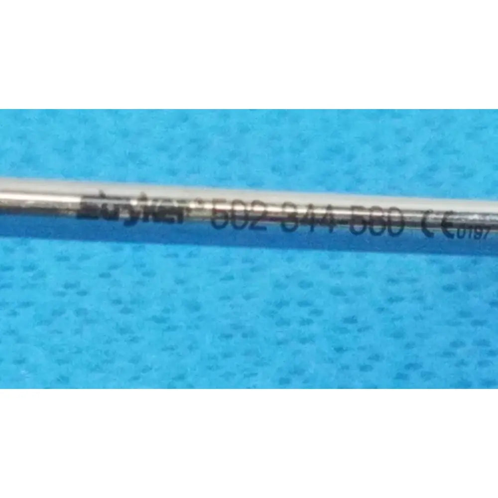 Silver-colored metal arthroscopic cannula speed-lock instrument engraved with euyker 502-344-560 ce 0197