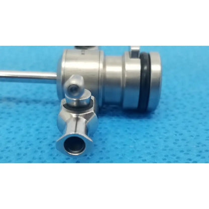 Silver-colored Stryker 1/21 N arthroscopic cannula speed-lock instrument with polished metal finish and black rubber seals