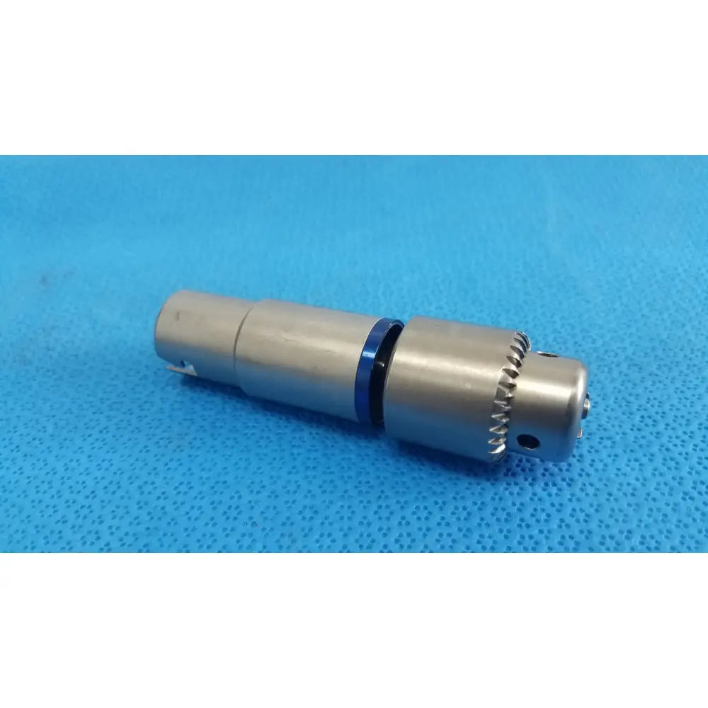 Silver-colored metal xlr audio connector with blue ring and threaded locking for reuse medical orthopedic instruments