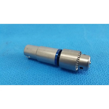 Silver-colored metal xlr audio connector with blue ring and threaded locking for reuse medical orthopedic instruments
