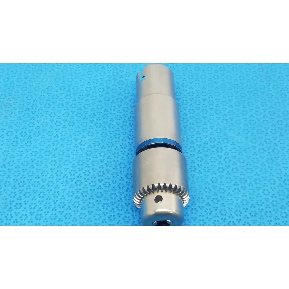 Stryker 1/4 inch silver metal drill attachment with blue ring and gear teeth for reuse medical orthopedic instruments
