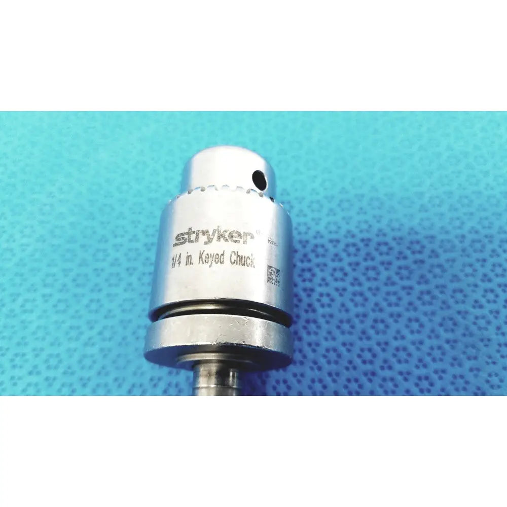 Stryker 1/4 inch keyed chuck with polished metallic finish and engraved branding for reuse medical applications