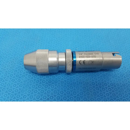 Stryker 1/4 keyless drill metal with textured grip and blue accent band designed for reuse medical applications