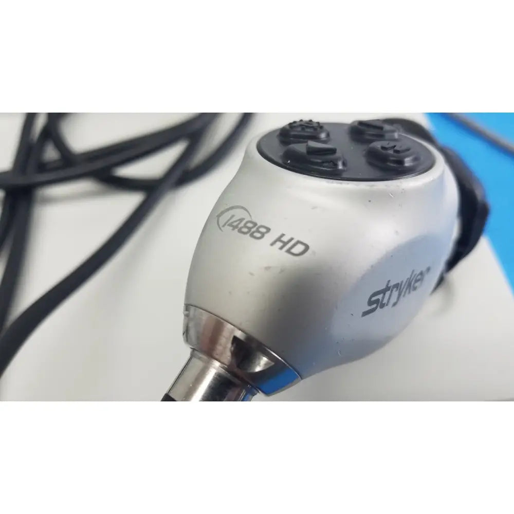 Stryker 1488 HD camera system with silver and black reuse medical camera head and matte finish handle with four buttons
