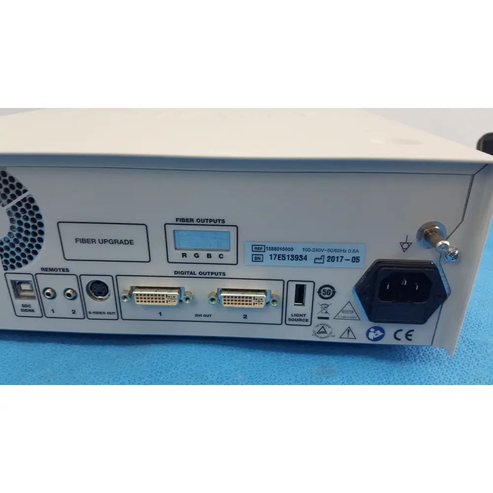 Back side of white stryker 1588 aim hd camera system with multiple ports and fiber output for reuse medical endoscopy