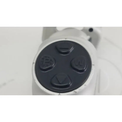 Black directional pad with embossed symbols on a white gaming controller for reuse medical aim hd camera system