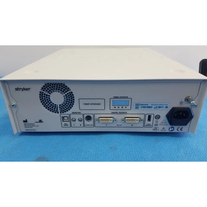 Rear panel of white stryker 1588 aim hd camera system with circular vent grille and fiber digital reuse medical ports