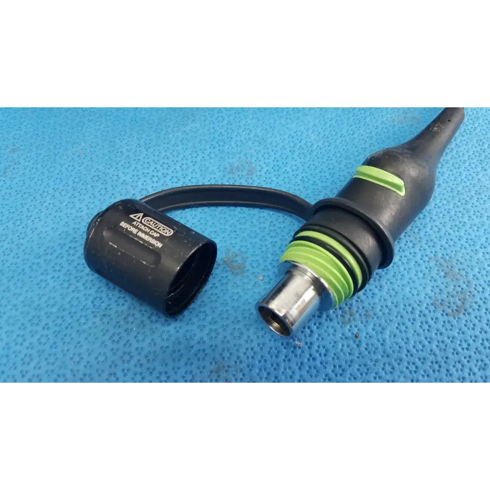 Black and green industrial air hose connector with metallic threaded end for reuse medical aim hd camera system