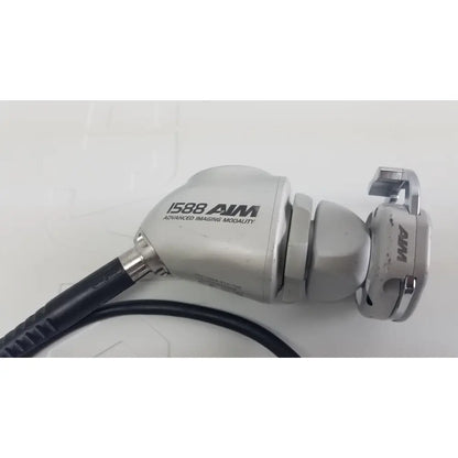 Silver metallic stryker 1588 aim hd camera imaging probe with black cable for advanced reuse medical endoscopy