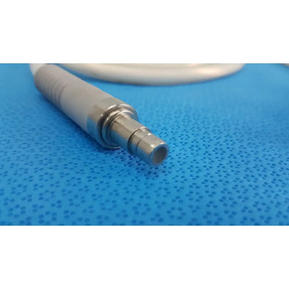 Gray and metallic stryker 195q fiber optic dental handpiece with textured grip and threaded connection for precision use