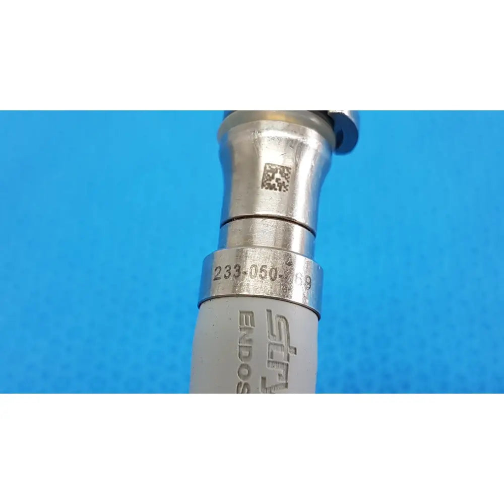 Silver and gray metallic stryker 195q fiber optic light cable surgical instrument with engraved model number 233-050