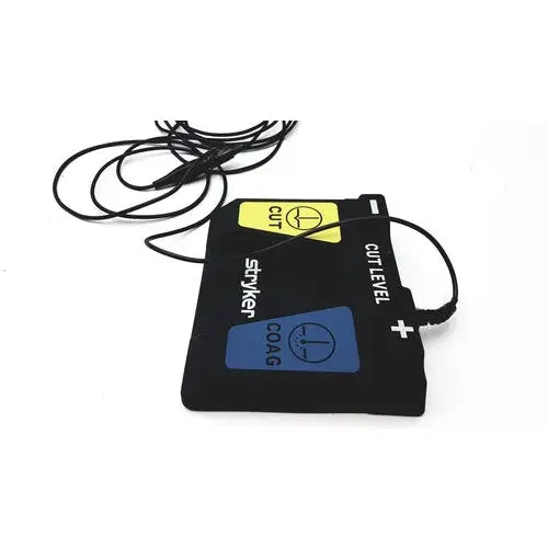 Black rectangular medical electrode pad with yellow and blue labeled sections for serfas energy footswitch by styler
