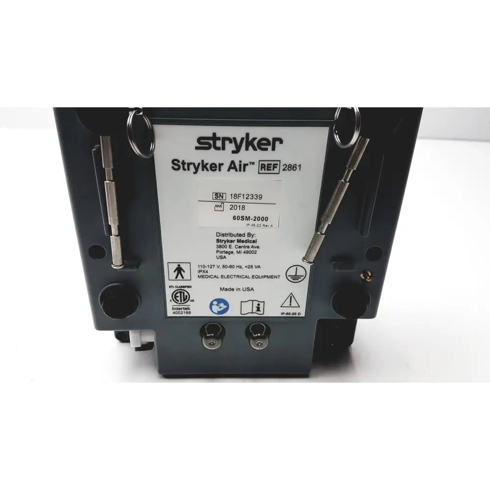 Black stryker 2861 low air loss pump medical equipment with silver latches and white model label for air loss pump isogel system