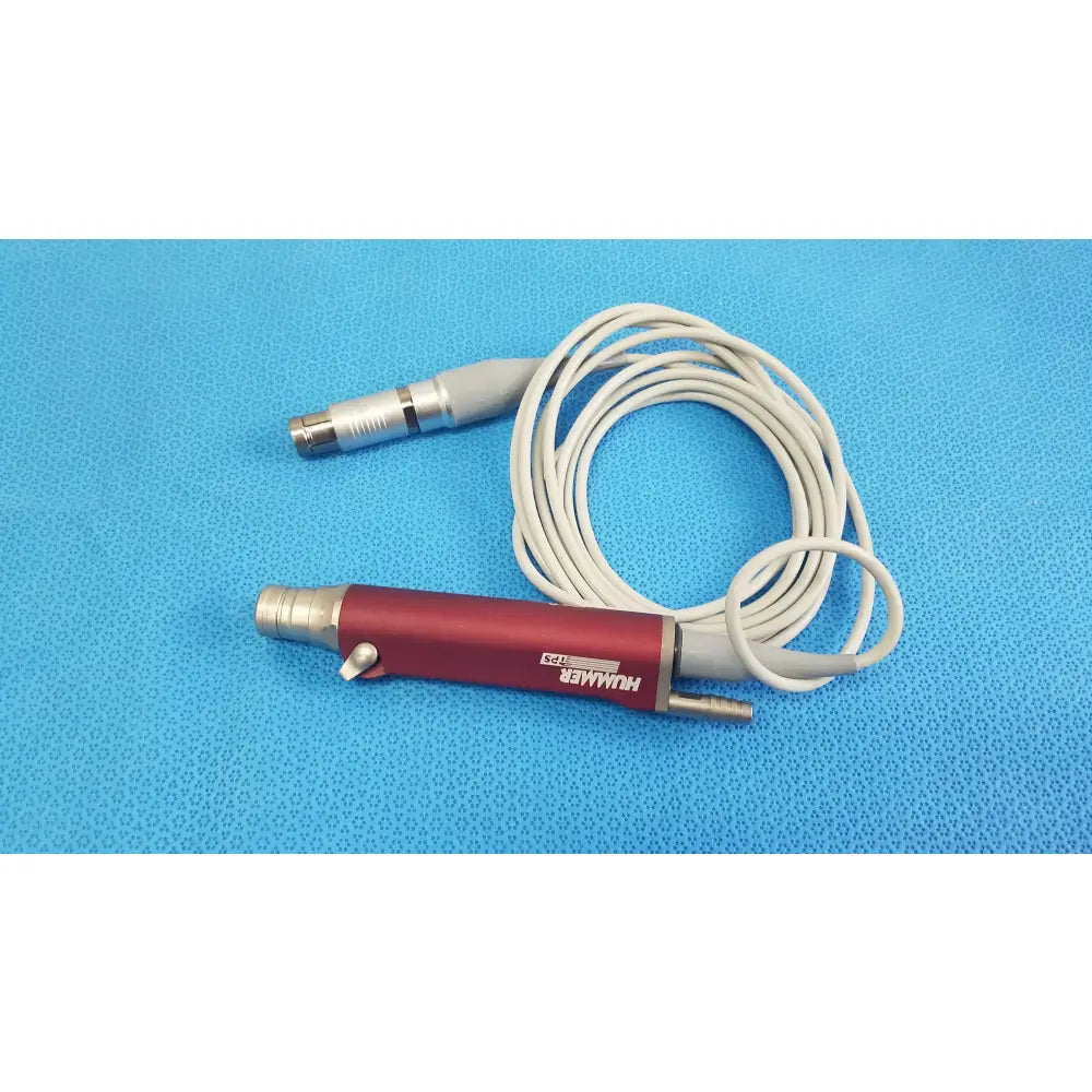 Red and silver tps leibinger hummer shaver handpiece with coiled white cable for precise surgical use