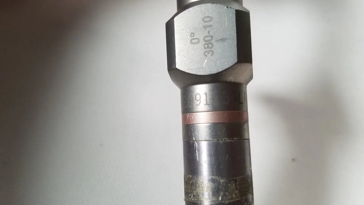 Metallic cylindrical stryker 380-10 10mm 0 degree rigid laparoscope with hexagonal head and copper-colored band