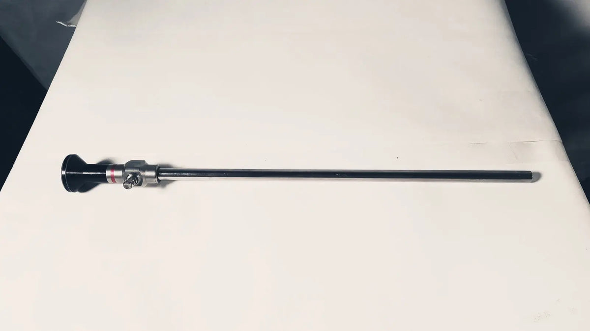 Stryker 380-10mm 0 degree rigid laparoscope with black and silver cylindrical body and metallic joints