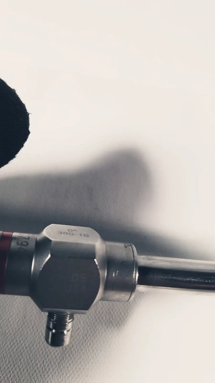 Silver metallic stryker 380-10mm 0 degree rigid laparoscope with hexagonal joint and red numerical markings