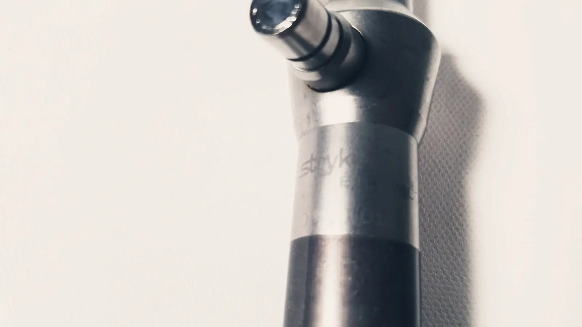 Silver and black torque wrench with polished metallic finish designed for reuse medical applications in stryker 380-11 laparoscope