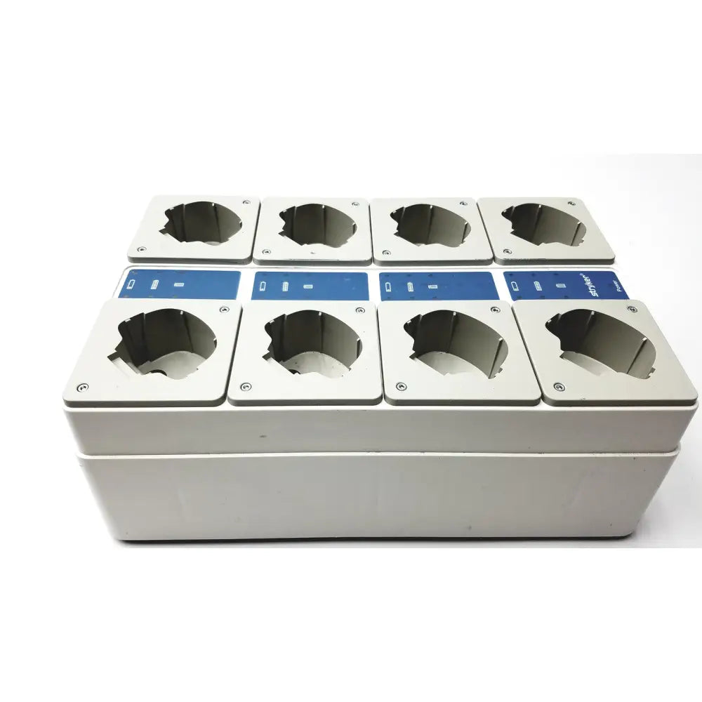 Set of eight silver metal charging station inserts with blue control panels for Stryker 400-655 eight station battery charger