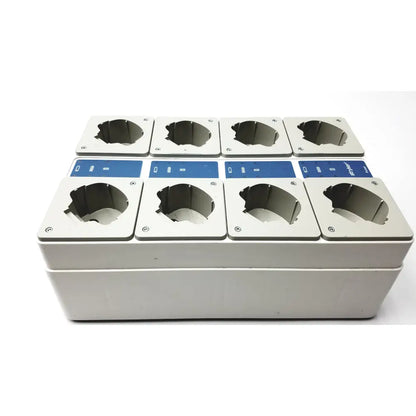 Set of eight silver metal charging station inserts with blue control panels for Stryker 400-655 eight station battery charger