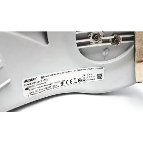 Gray plastic stryker flyte helmet 0.47kg with white label for personal protection 47kg personal protection