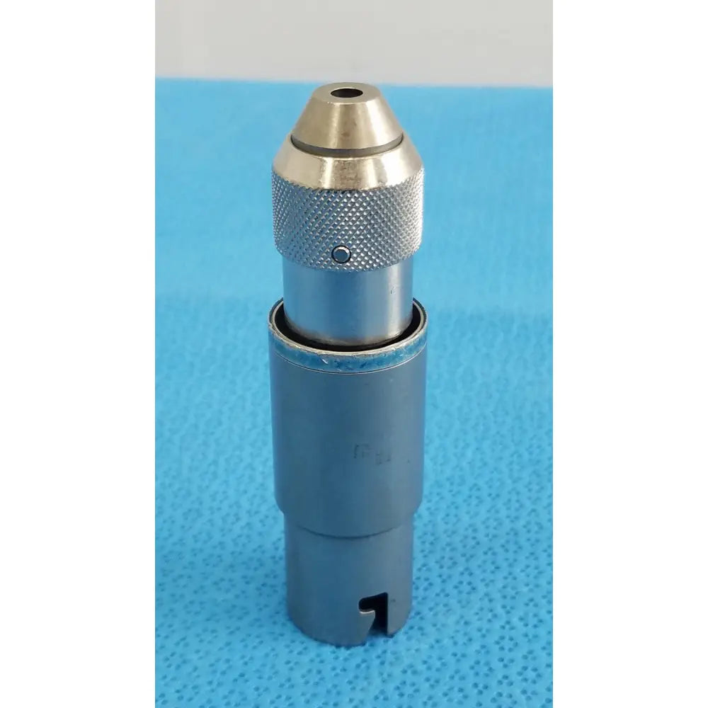 Stryker 4100-110-000 AO small drill surgical drill attachment with silver metallic chuck, knurled grip, and blue base