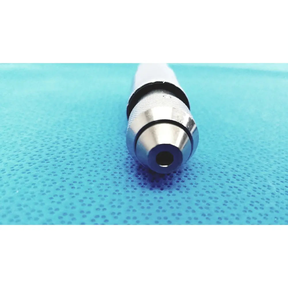 Stryker 4100-110 synthes style small drill attachment with silver metal drill bit, textured grip, and black rubber collar