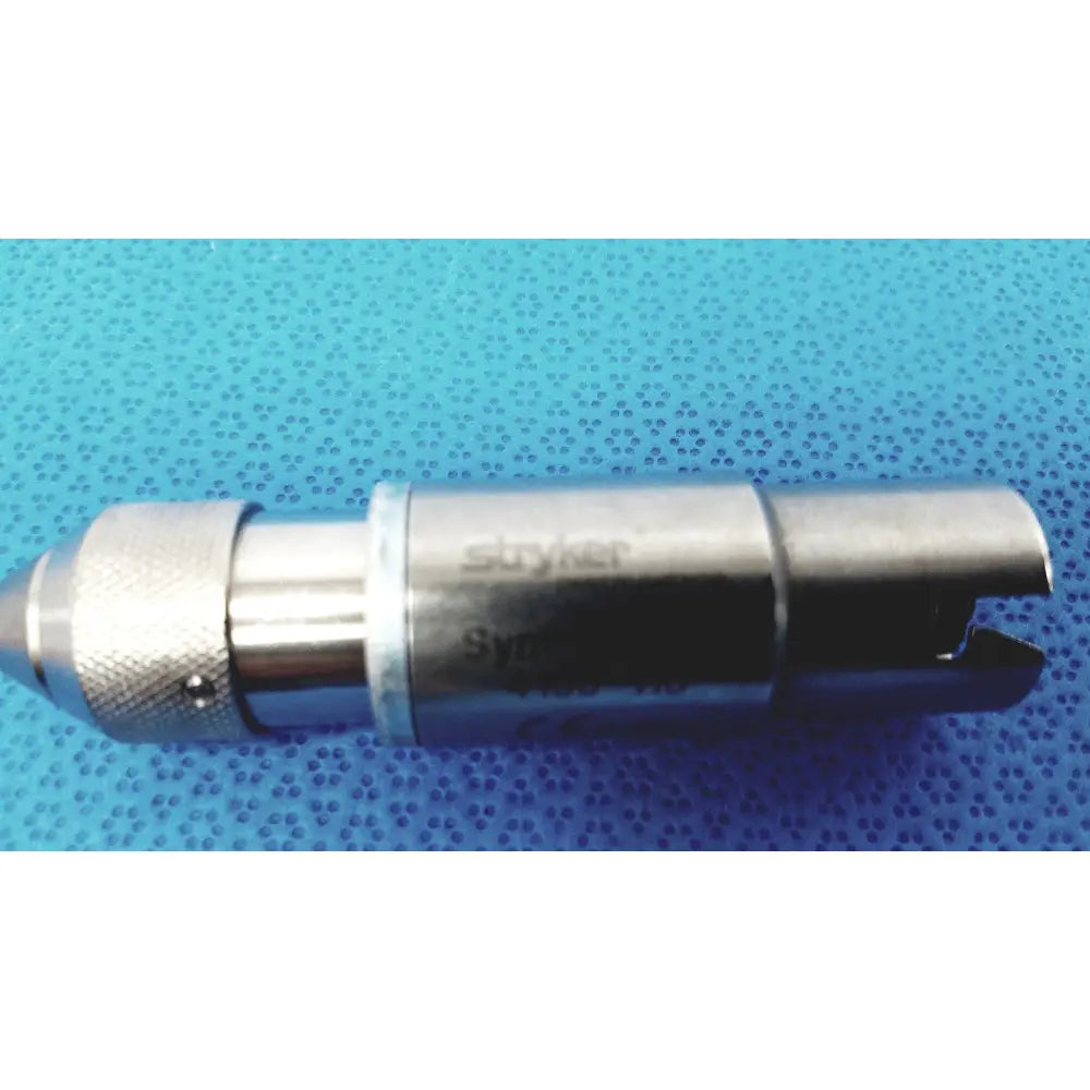 Silver metallic stryker synthes style small drill attachment with textured grip and curved end for precision use