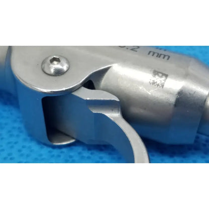 Silver pin collet with textured metallic finish and engraved markings for reuse medical orthopedic instruments