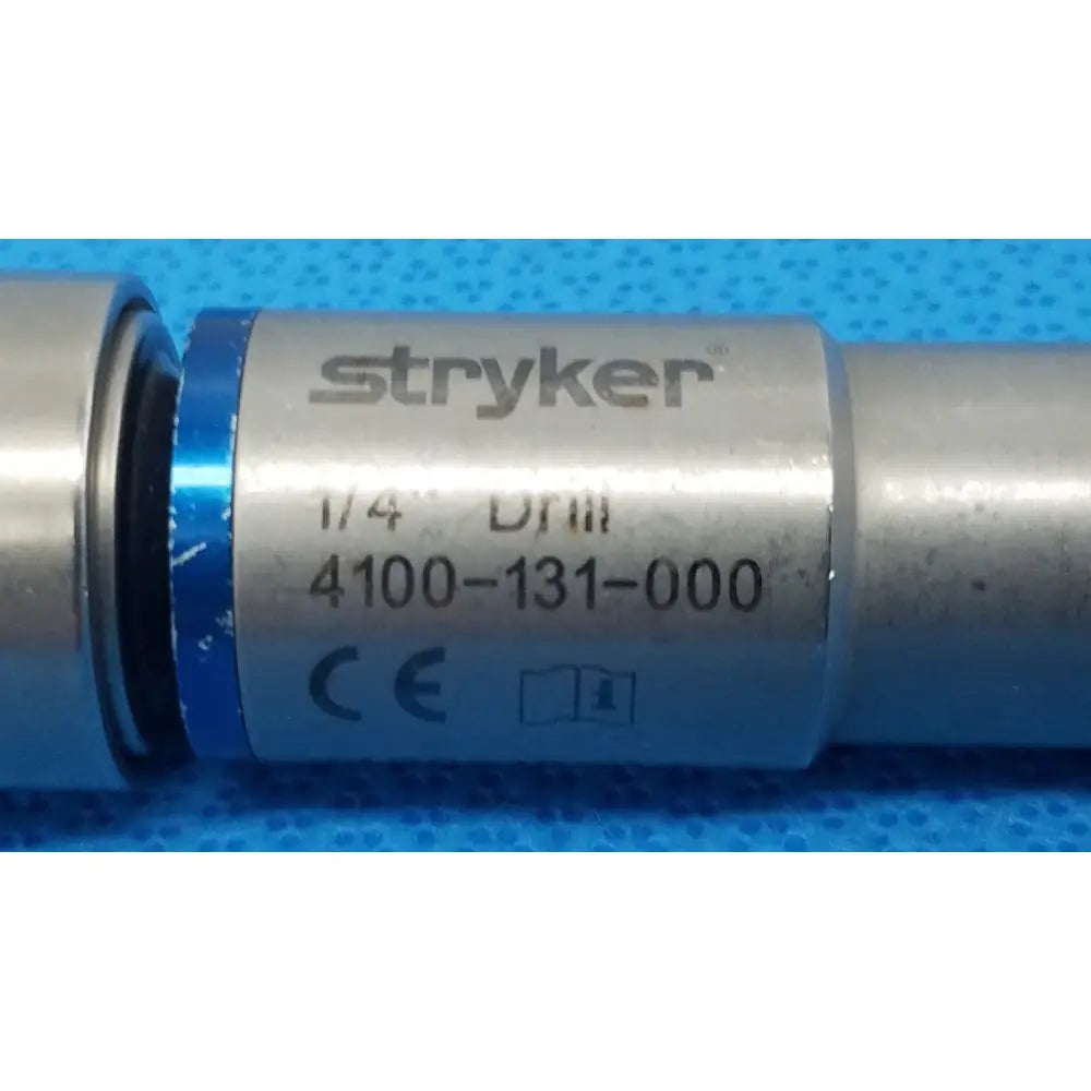 Stryker 4100-131-000 1/4 inch drill attachment with metallic silver body and blue accent for reuse medical use