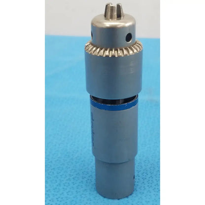 Stryker 4100-131-000 gray metallic 1/4 inch drill attachment with serrated gear and blue accent band for reuse medical use