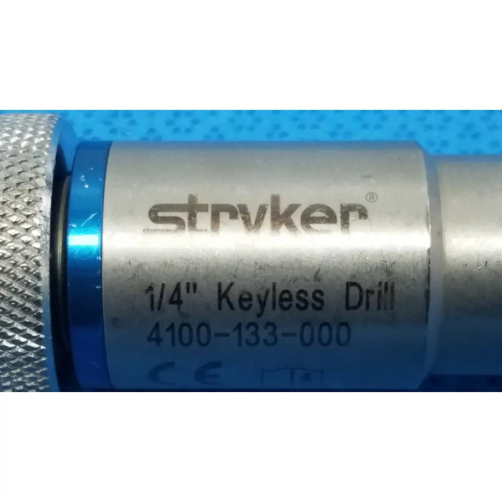 Silver and blue stryker 4100-133-000 1/4 inch keyless drill attachment with textured grip for secure handling