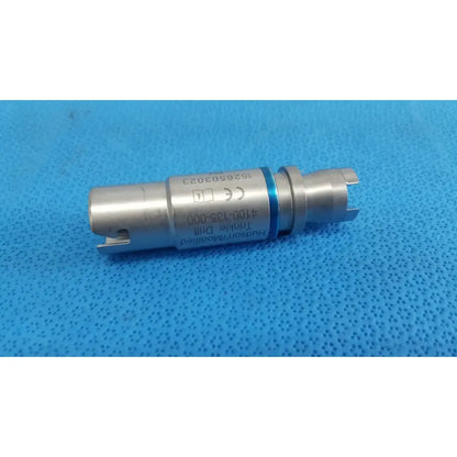 Silver-colored metal hudson modified trinkle drill bit with blue ring and engraved markings for surgical use by Stryker
