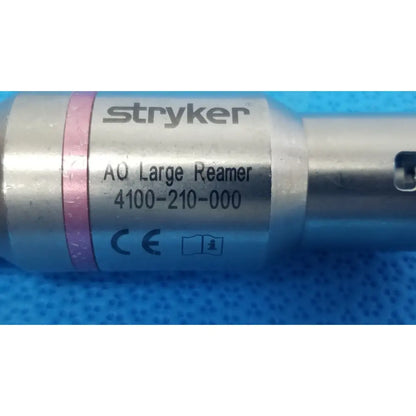 Stryker 4100-210-000 large reamer attachment with metallic silver body pink band and engraved labeling large reamer
