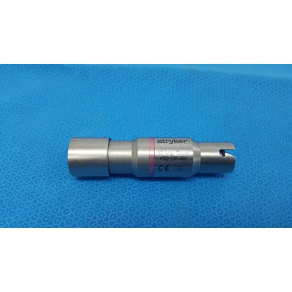 Silver metallic stryker 4100-210-000 large reamer attachment with cylindrical body, engraved markings, and pink stripe for reuse medical use