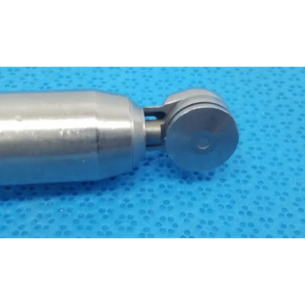 Silver-colored metallic stryker 4100-400 sagittal saw attachment with cylindrical body for reuse medical orthopedic saws