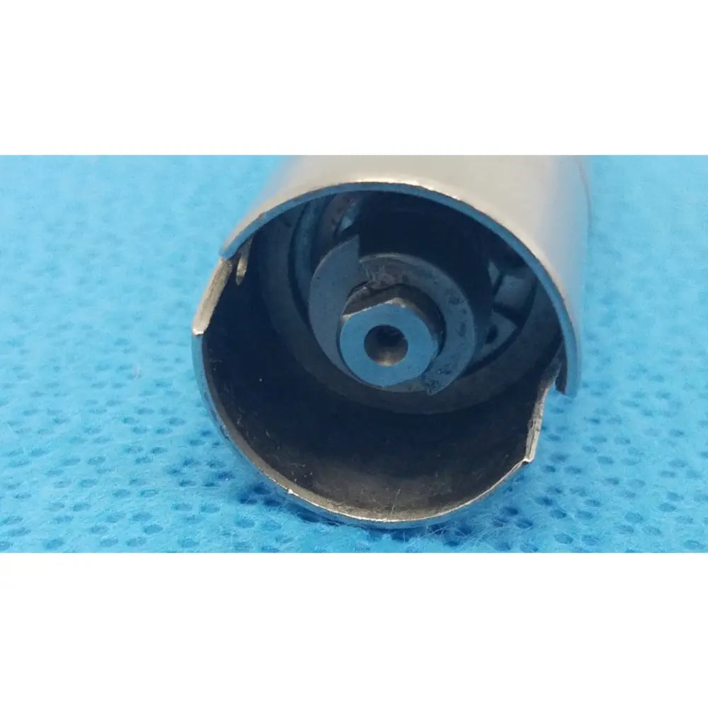 Silver cylindrical metal drill bit with hexagonal drive and internal gear for reuse medical orthopedic saws stryker 4100-400 attachments