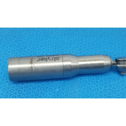 Silver stryker 4100-400 sagittal saw attachment with metallic cylindrical body and engraved branding for reuse medical orthopedic saws