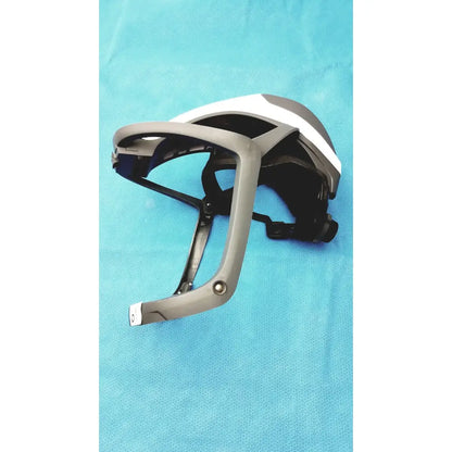 Gray and white stryker 416-600-000 surgical helmet with black interior straps and power cord protective headgear