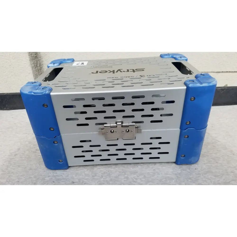 Silver metal and blue plastic stryker cd3 sabo sports medicine trauma sterilization case with perforated sides