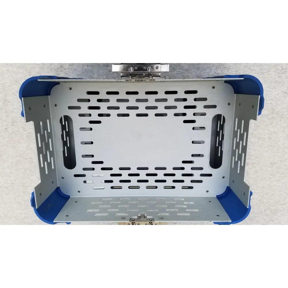 Blue and silver metal sports medicine trauma cd3 sabo pet carrier with perforated sides and latch mechanism