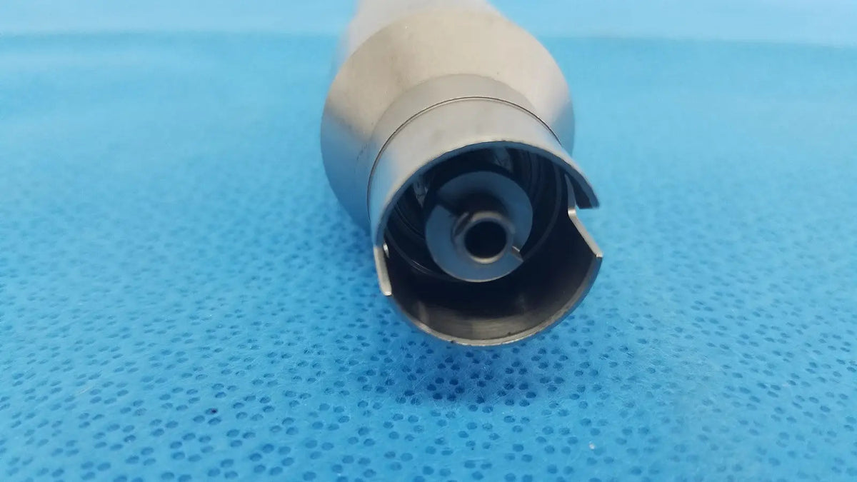 Silver metallic poweream large surgical instrument handle with polished cylindrical finish and open-ended reuse medical connector