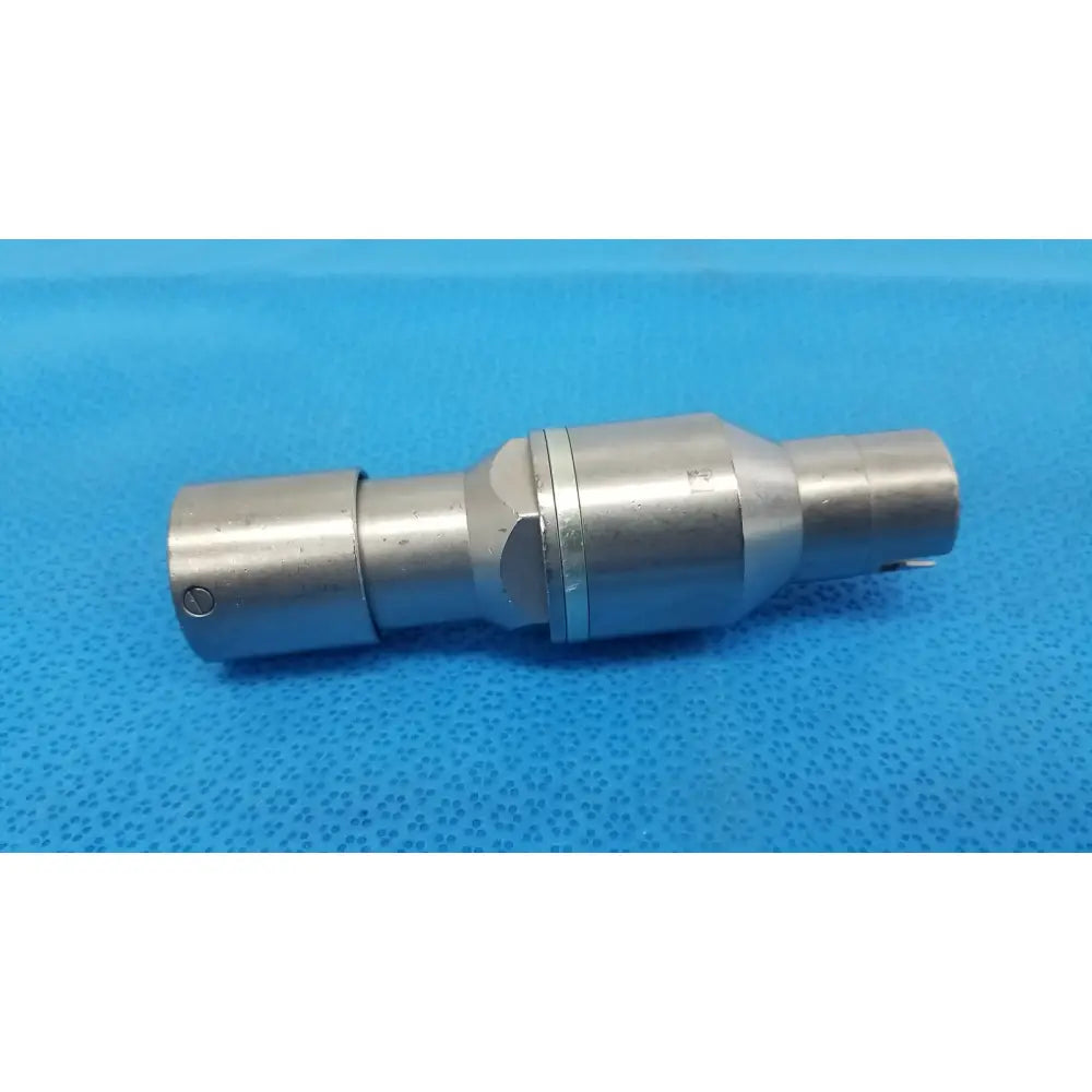 Silver metallic poweream large surgical instrument with cylindrical body and hexagonal cutout for reuse medical applications