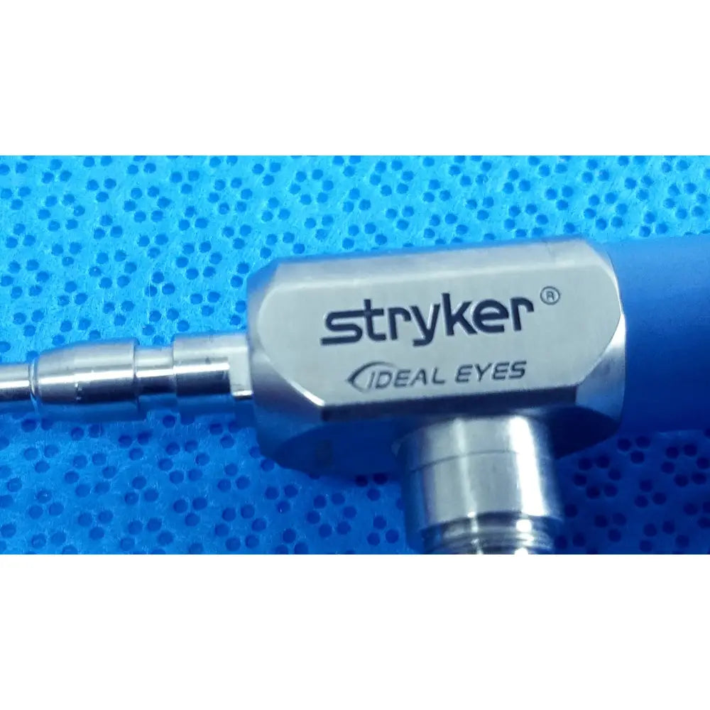 Silver stryker ideal eyes 4mm 30 degree autoclavable endoscope with metallic hexagonal body and blue tubing attachments