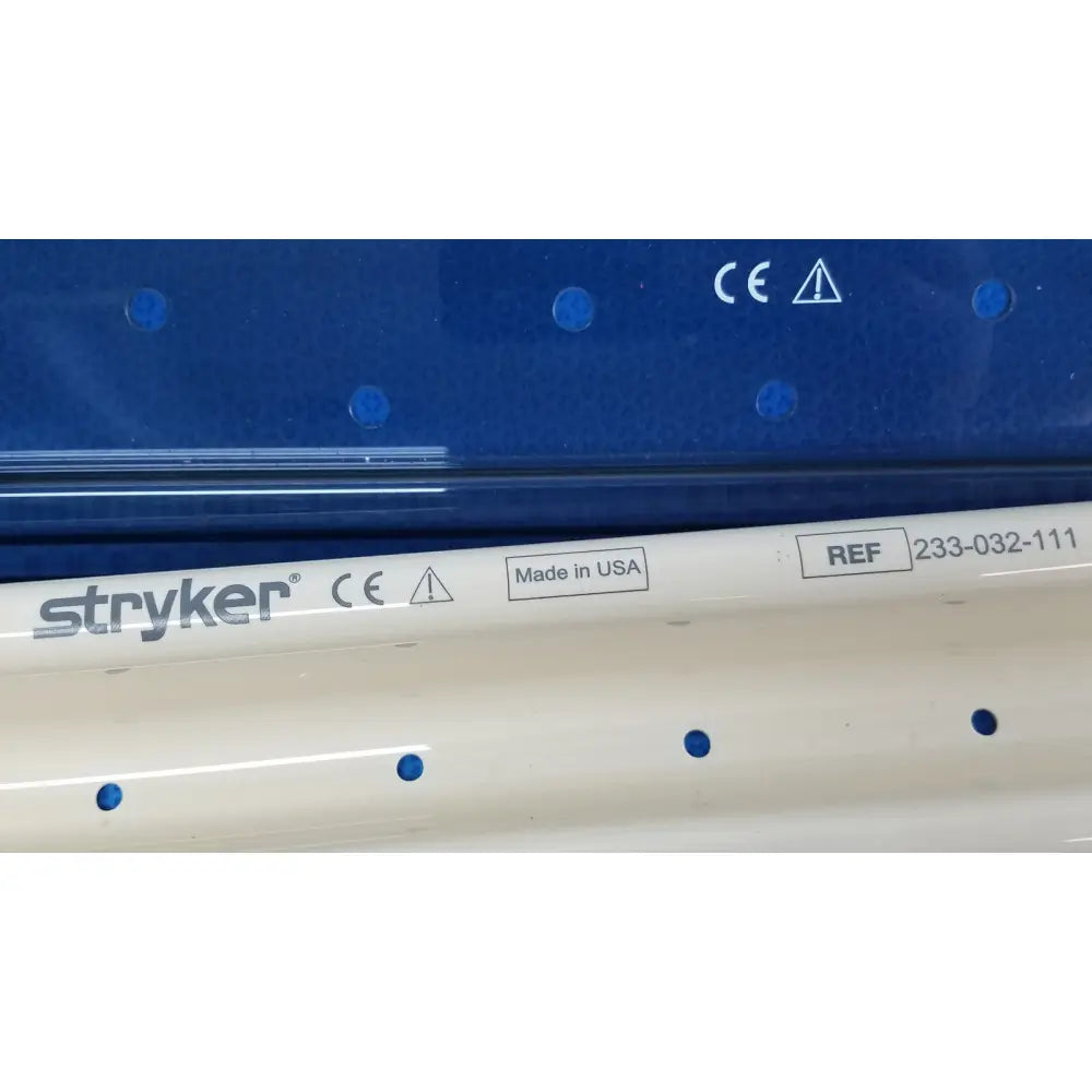 White stryker ideal eyes 10mm autoclavable medical device with blue circular indentations and made in usa label