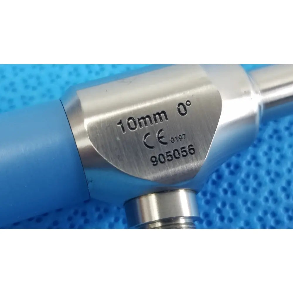 Silver metallic surgical instrument ideal eyes 10mm with blue ergonomic grip and engraved specifications by Stryker