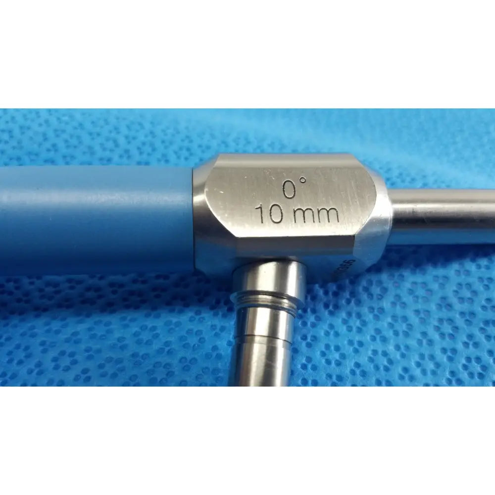 Blue-handled metallic ideal eyes 10mm surgical instrument with angled joint marked 0° for precision use