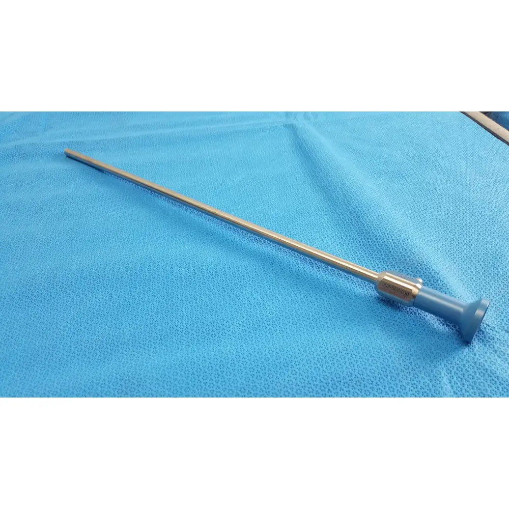 Silver surgical instrument with blue plastic handle and metallic shaft ideal eyes 10mm autoclavable by stryker