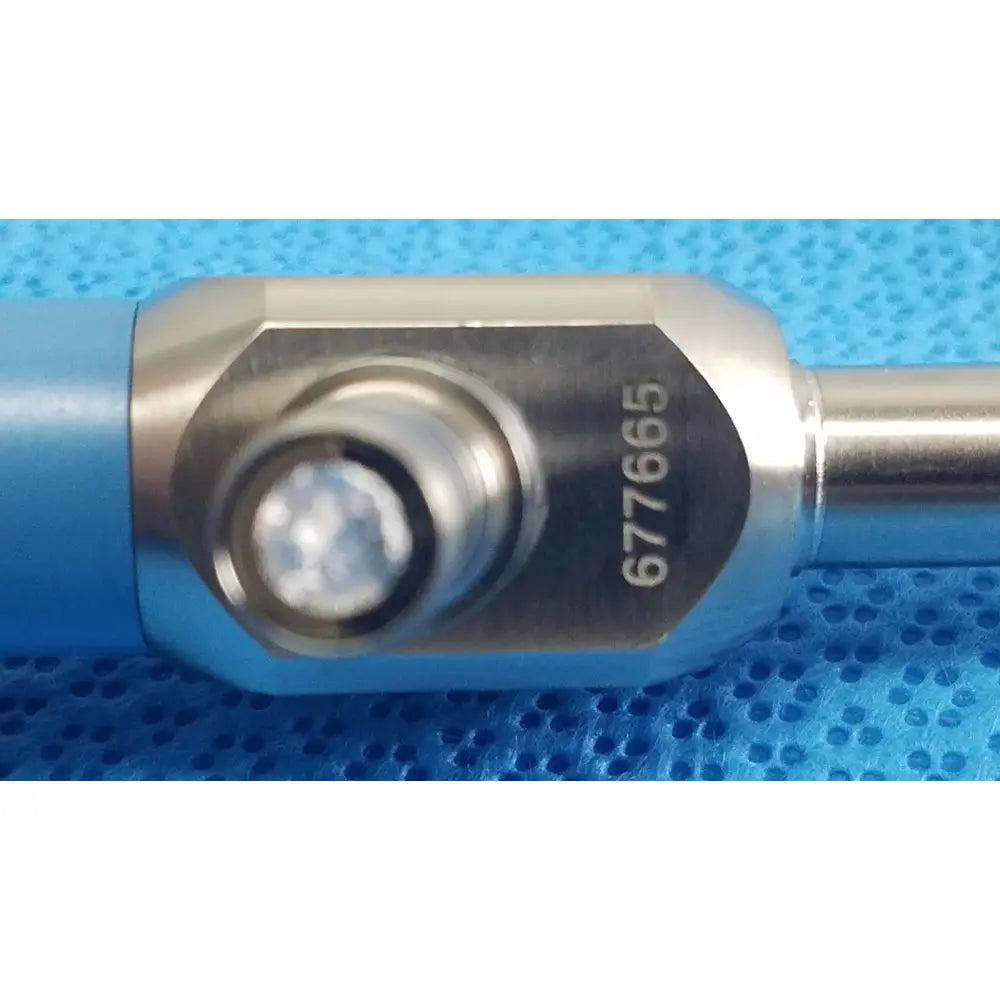 Blue and silver torque wrench with engraved serial number 677665 for Stryker ideal eyes 10mm autoclavable use